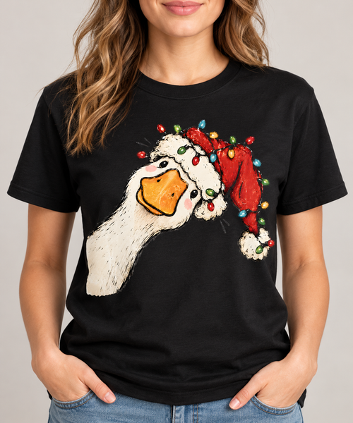Christmas goose graphic tee on black shirt, shown on model