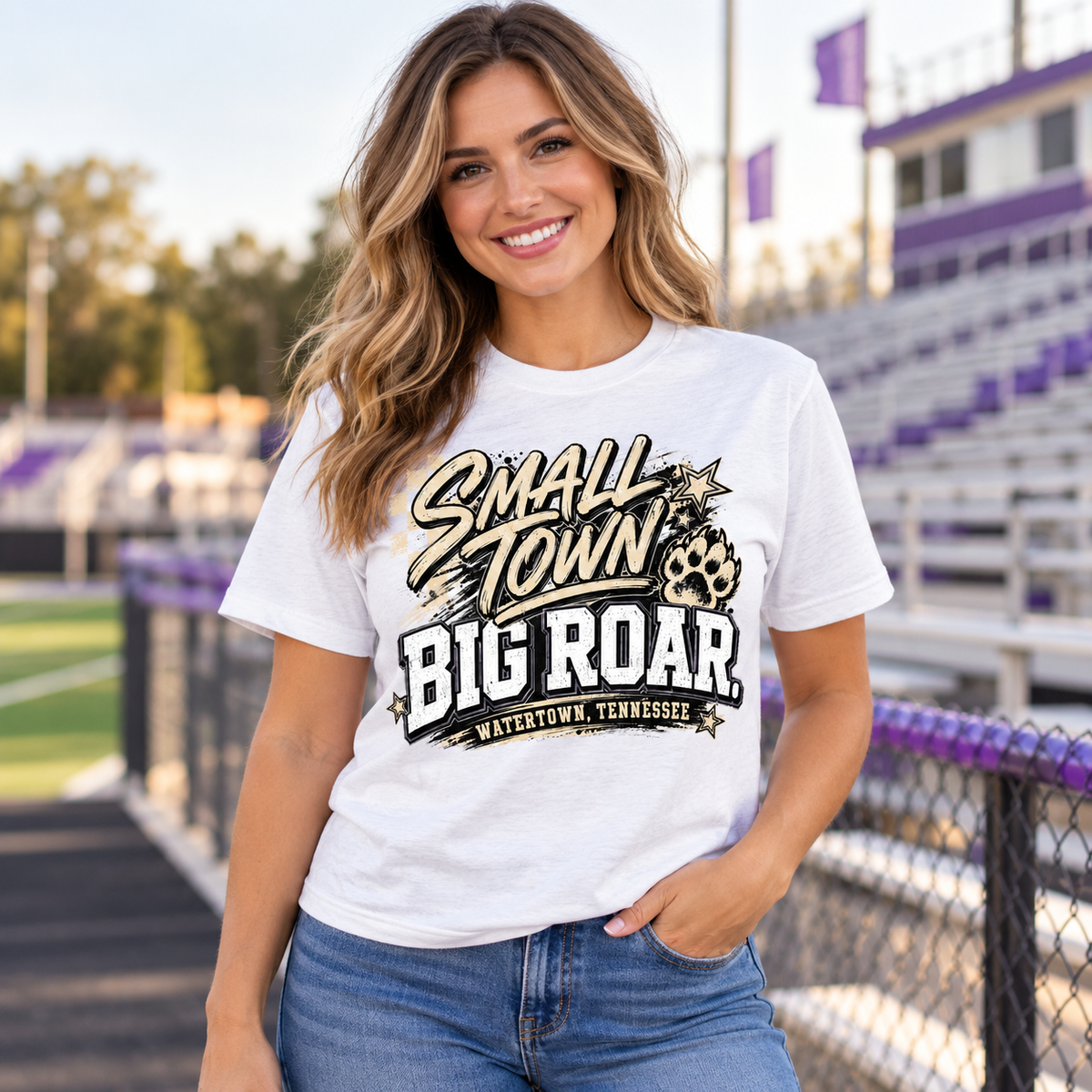 Model wearing Small Town Big Roar Watertown Graphic Tee – School Spirit Shirt