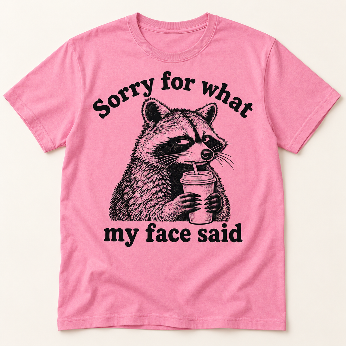 Pink Sorry for What My Face Said raccoon graphic tee flat mockup