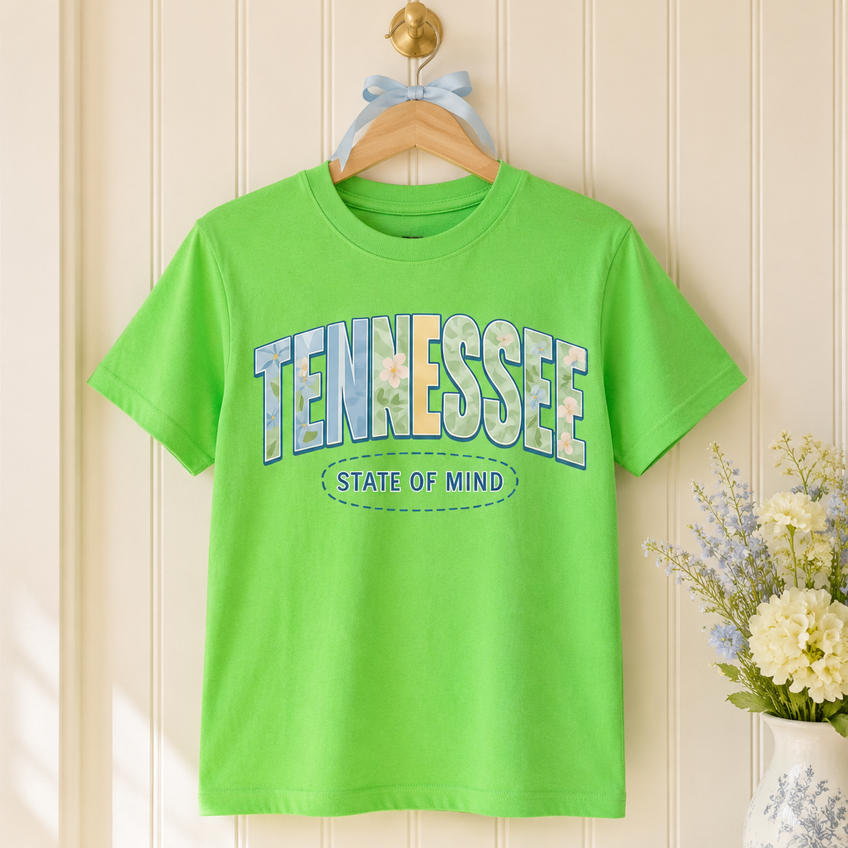 Lime green Tennessee State of Mind floral graphic tee on a wooden hanger