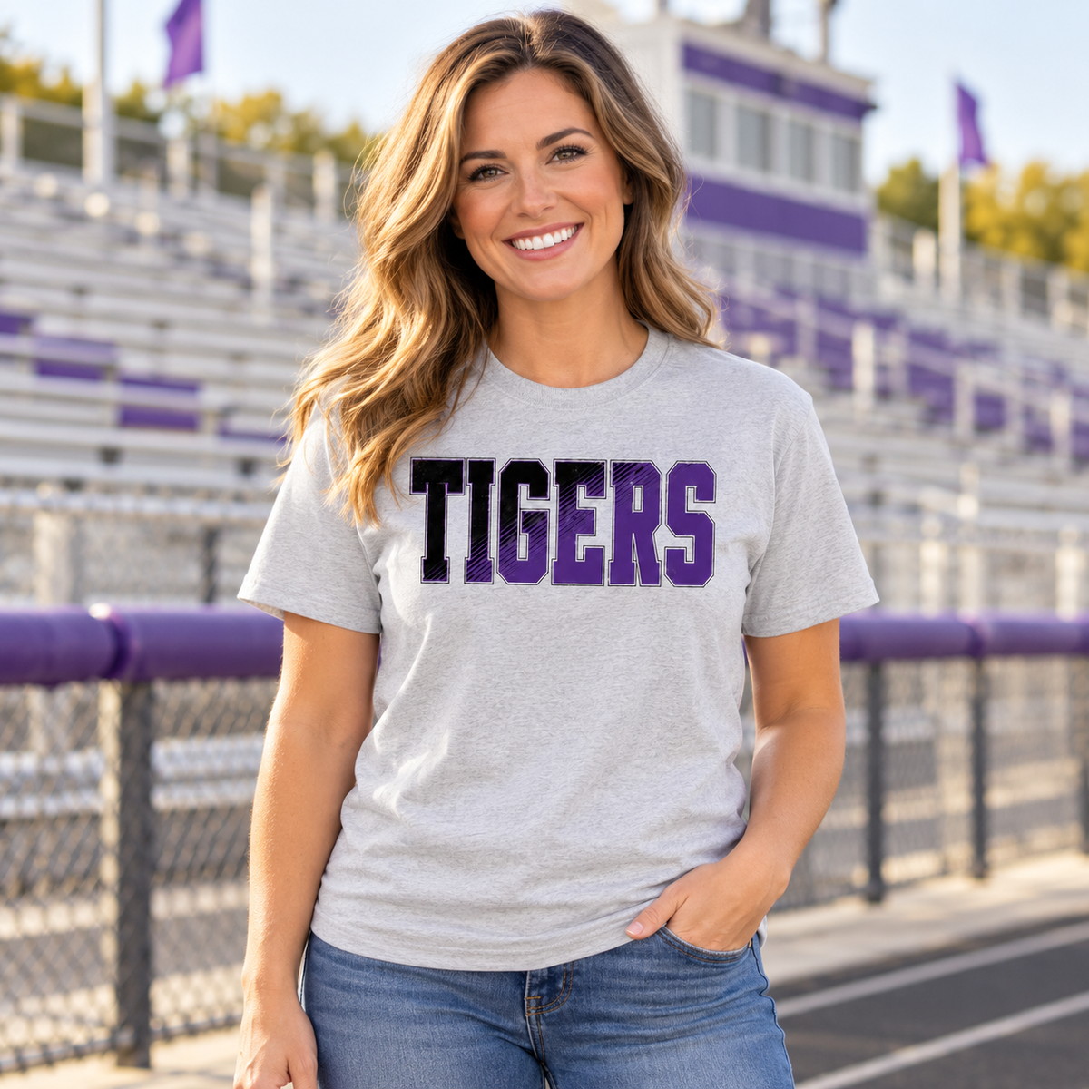 Model wearing Watertown Tigers Black & Purple Diagonal Graphic Tee